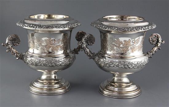 A pair of 19th century Old Sheffield plate Campana vase shaped wine coolers and liners, height 25cm.